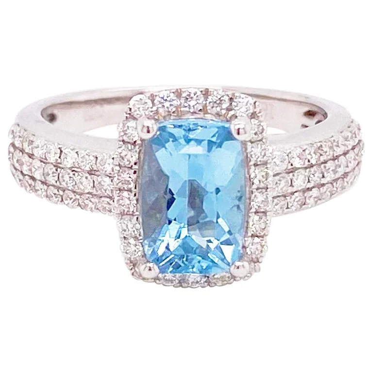 trendy rings for women-Aquamarine and Diamond Halo Ring