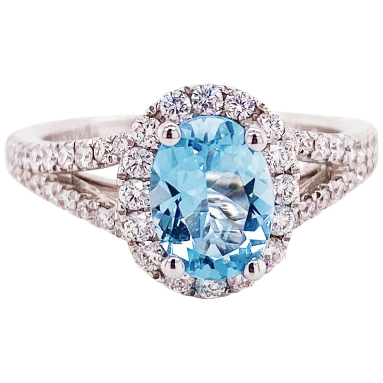 radiant diamond rings for women-Oval Aquamarine and Diamond Halo Engagement Ring